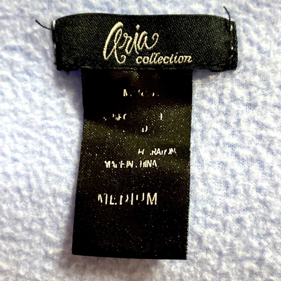 Periwinkle fleece pajamas with polka dot bottoms - Picture 9 of 11